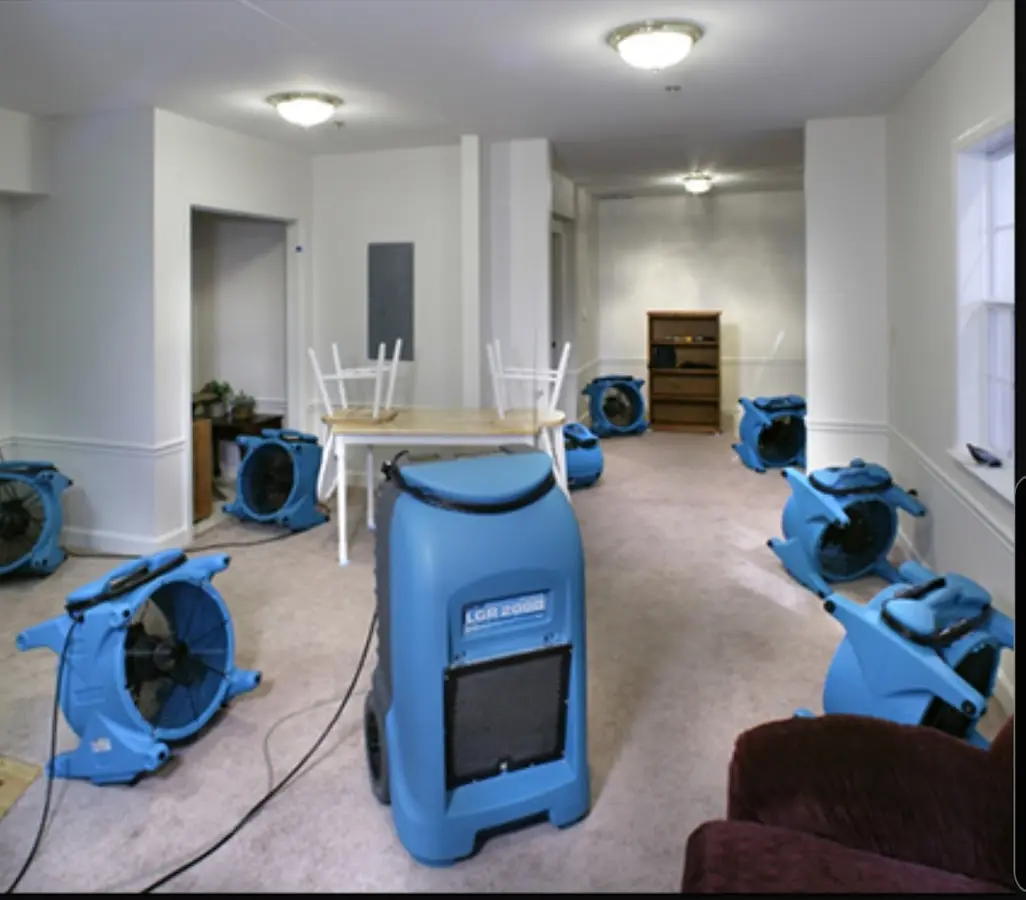 Air movers and dehumidifier setup for Water Damage Restoration in Palmer